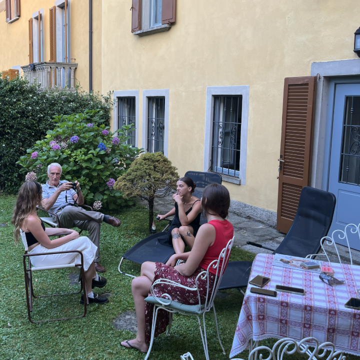 Family and friends relaxing in the villa garden