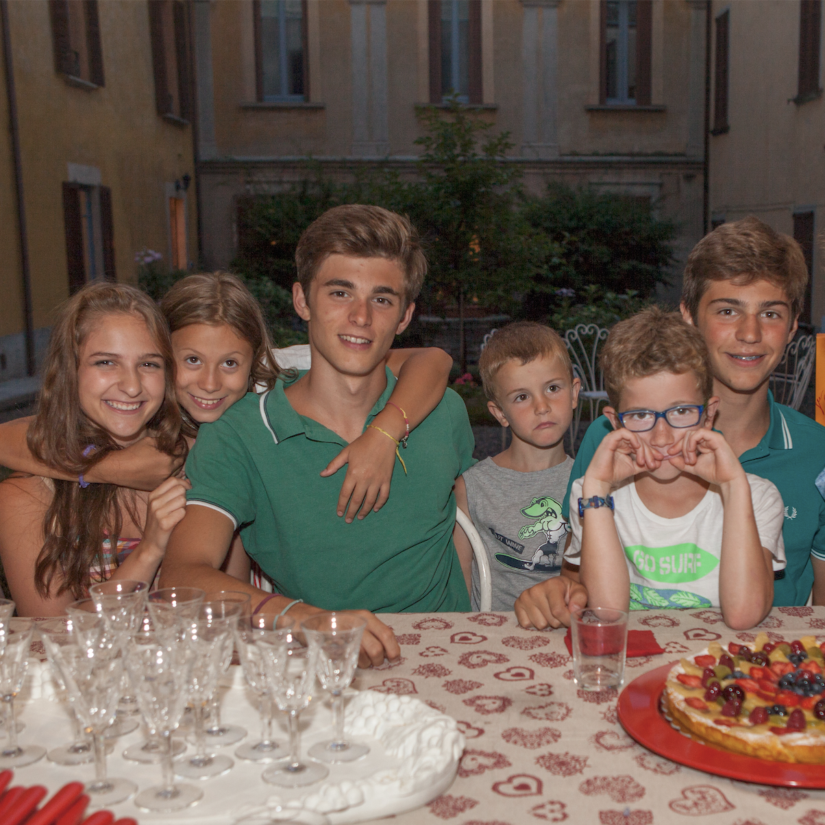 Family gathered around a birthday table