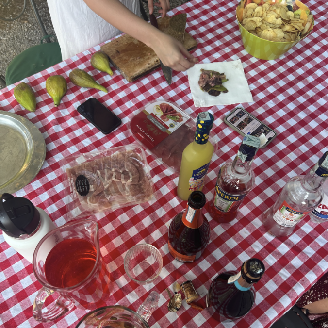 Family sharing a meal in the courtyard